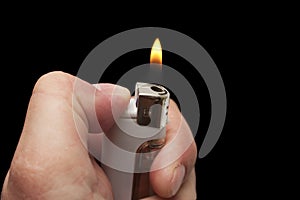 Hand with a cigarette lighter