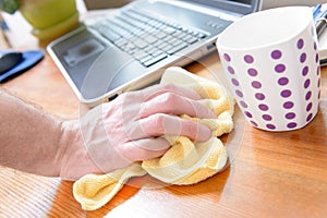 Hand cleaning desk at home