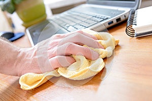 Hand cleaning desk at home