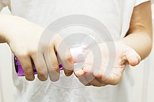 Hand cleaning gel. Ðntibacterial gel in human hands