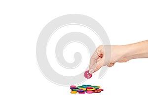 Hand with colorful sewing buttons, decoration accessory