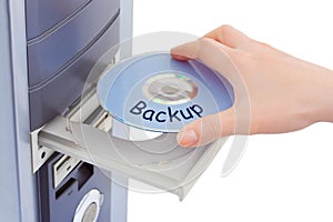 Hand and computer disk backup photo