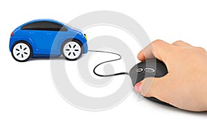 Hand with computer mouse and car