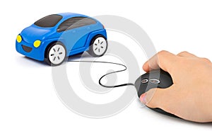 Hand with computer mouse and car