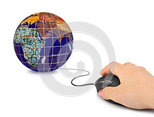 Hand with computer mouse and globe