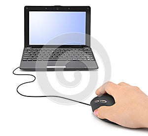 Hand with computer mouse and notebook