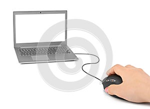 Hand with computer mouse and notebook