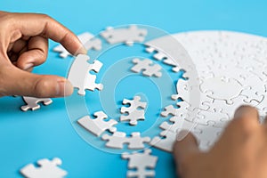 Hand connect jigsaw parts with word problem & solution.   symbol of association and connection. business strategy. Teamwork