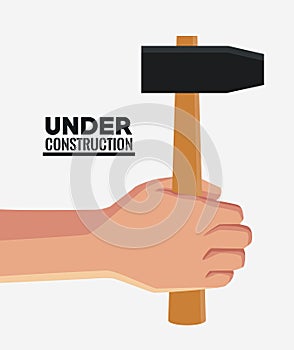 Hand with construction tool