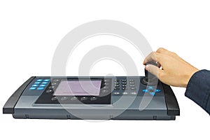 Hand on the control panel keyboard for monitor CCTV camera or pl