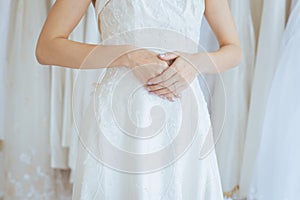 Hand coordinate of beautiful asian woman bride with engagement ring on her finger,Ceremony in wedding day,Happy and smiling