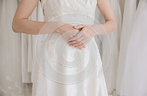 Hand coordinate of beautiful asian woman bride with engagement ring on her finger,Ceremony in wedding day,Happy and smiling