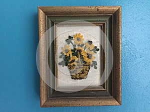 Hand crafted crewel picture of a basket of Sunflowers