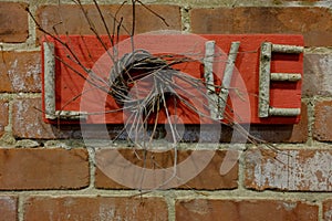 Hand Crafted Love Sign On Brick Wall