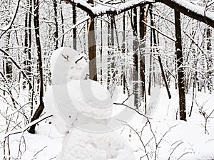Hand-crafted snowman closeup in snow-covered park