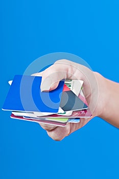 Hand with credit cards