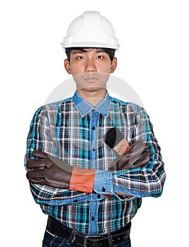 Hand cross of engineer holding paint brush wear Striped shirt blue and glove leather with white safety helmet plastic On the head