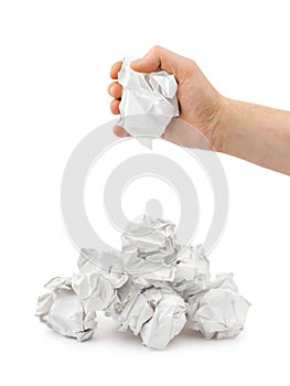Hand and crumpled paper