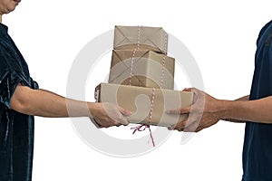 hand customer accepting a delivery of boxes from delivery man postal isolated on white background. Woman hand accepting