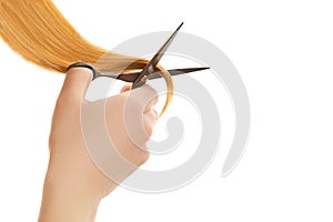 Hand cut split ends by hair scissors.