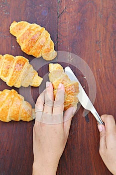 Hand cutting croissant