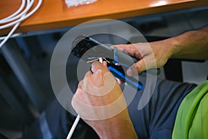 Hand cutting ethernet network cable with tool for crimping rj-45 connectors