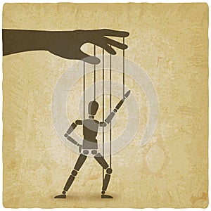 Hand with dancing puppet vintage background