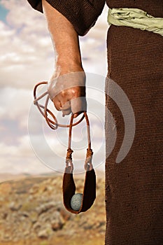 Hand of David Holding Slingshot photo