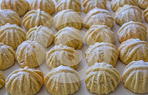 Hand decorated `Maamoul` an Arab dessert filled cookies, made with dates paste, almonds, walnuts and cinnamon