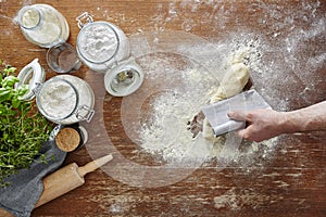 Hand dividing dough kitchen scene homemade baking