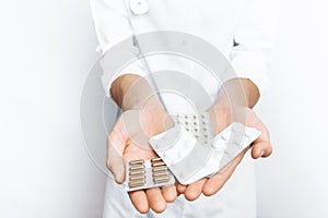 Hand doctor holding tablet, close-up, white background, for advertising, text insertion