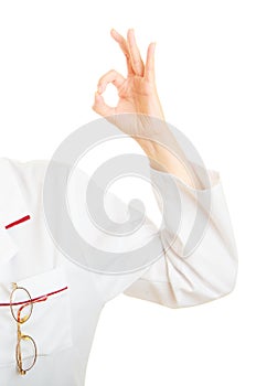 Hand of doctor showing ok okay hand sign gesture