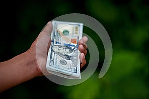 Hand and dollar pictures Concept of business finance