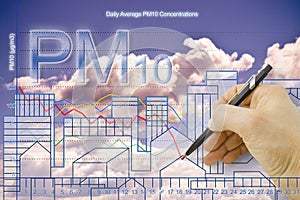 Hand drawing a chart about particulate matter emission PM10 in the air against a city skyline - concept image