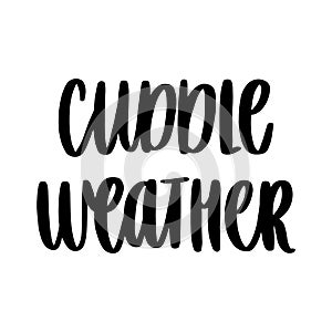 The hand-drawing inspirational quote: Cuddle weather, in a trendy calligraphic style.