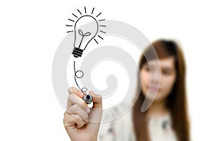 Hand drawing light bulb idea.