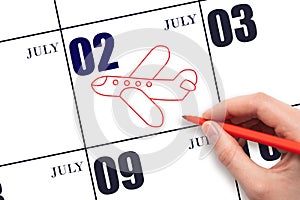 A hand drawing outline of airplane on calendar date 2 July. The date of flight on plane.