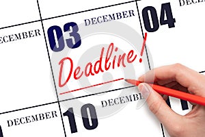 Hand drawing red line and writing the text Deadline on calendar date December 3. Deadline word written on calendar