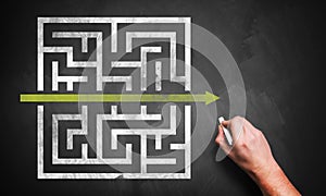 Hand drawing a shortcut to a maze