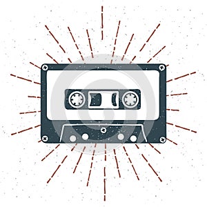 Hand drawn 90s themed badge with audio cassette tape grunge textured and vintage sunburst. Vector