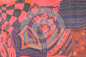 Hand-drawn abstract pattern on red silk scarf photo