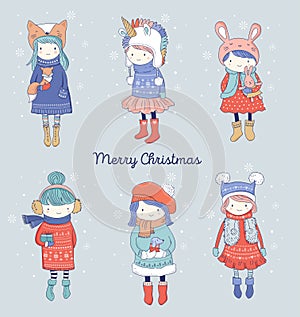 Hand drawn beautiful cute little winter girls collection. Merry Christmas greeting cards design