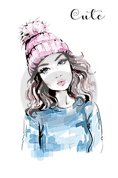 Hand drawn beautiful woman portrait. Fashion woman in knitted hat with pompom. Stylish look. Fashion girl.