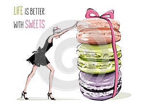 Hand drawn beautiful young woman in black dress. Fashion woman pushing colorful macaroons. Fashion female look. Beautiful set.