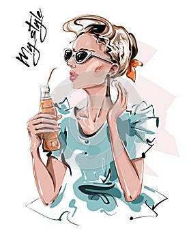 Hand drawn beautiful young woman with bottle of juice. Stylish girl in sunglasses. Fashion woman look. Sketch.