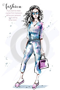 Hand drawn beautiful young woman with long curly hair. Stylish elegant girl with bag. Fashion woman portrait.