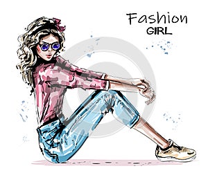 Hand drawn beautiful young woman sitting on floor. Stylish elegant girlin sunglasses. Fashion woman look.