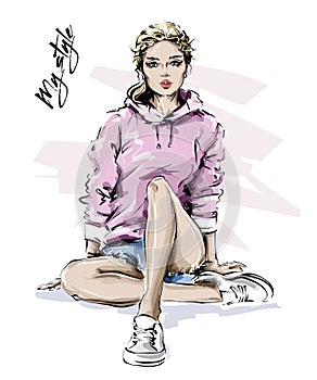 Hand drawn beautiful young woman in sport clothes. Stylish blonde hair girl. Fashion woman look. Sketch. photo