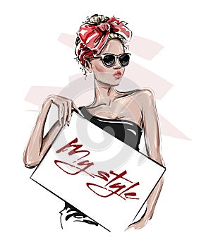 Hand drawn beautiful young woman in sunglasses holding poster. Stylish girl with bow on her head. Fashion woman look. Sketch.