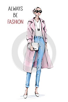 Hand drawn beautiful young woman wearing coat and jeans. Stylish girl in sunglasses holding white bag. Fashion woman look. Sketch.